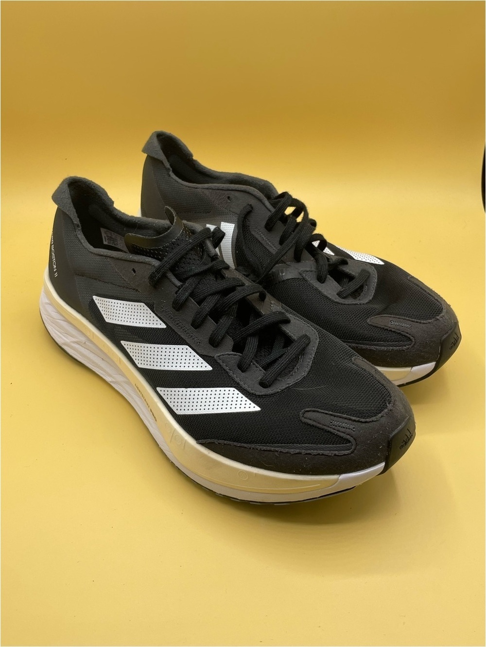 Adidas Adizero Boston 11 in core black and white